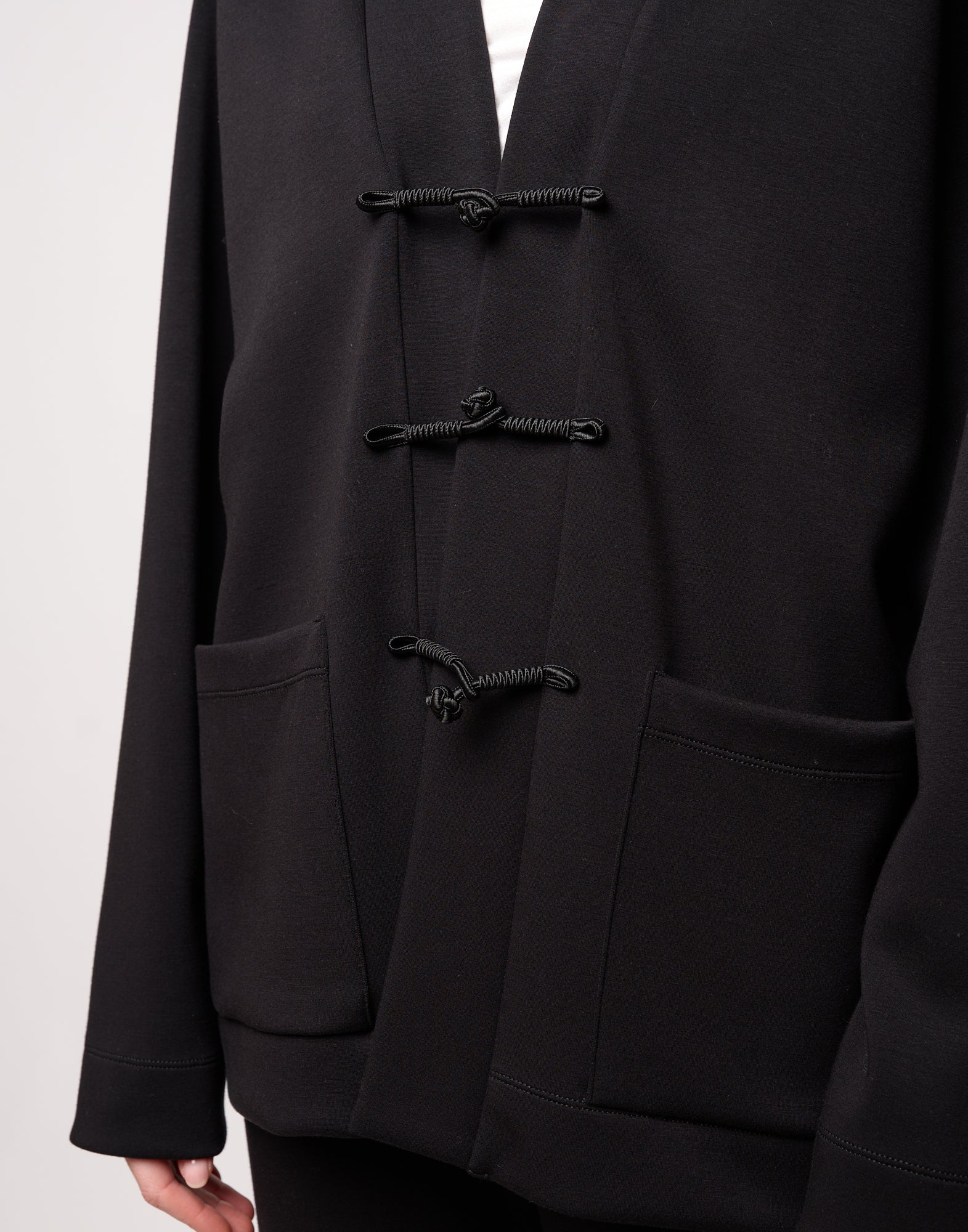 DOUUOD Cardigan Raglan con Alamari Nero