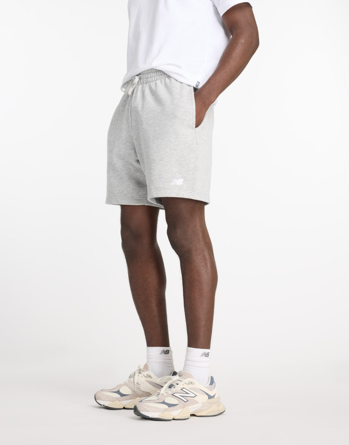 NEW BALANCE Bermuda Sport Essentials in French Terry Grigio Mélange