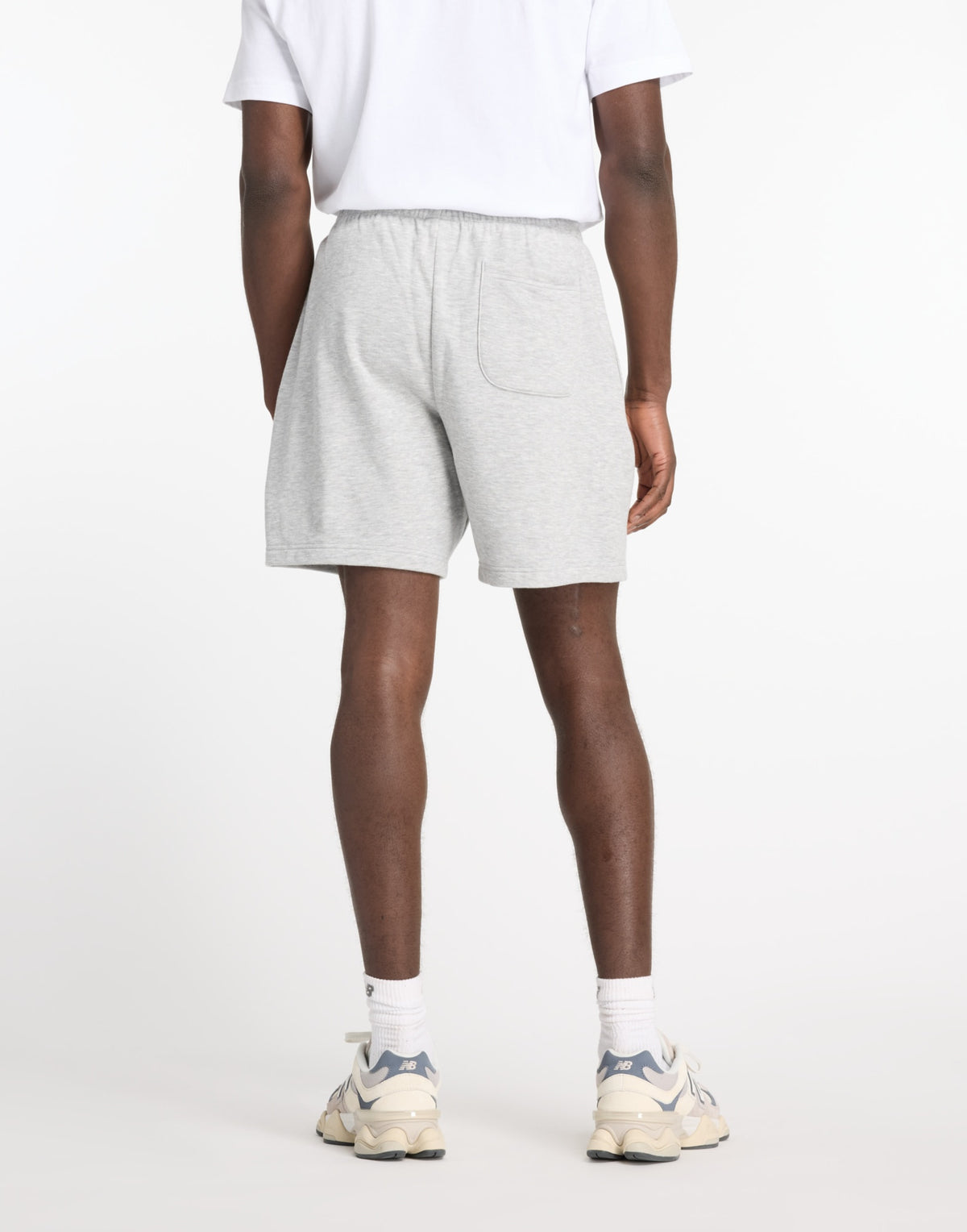 NEW BALANCE Bermuda Sport Essentials in French Terry Grigio Mélange