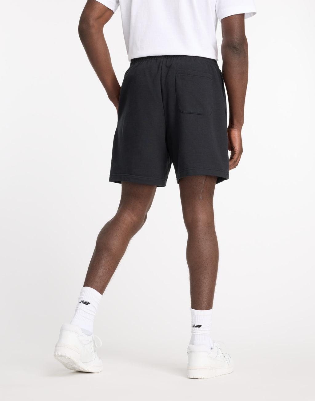 NEW BALANCE Bermuda Sport Essentials in French Terry Nero